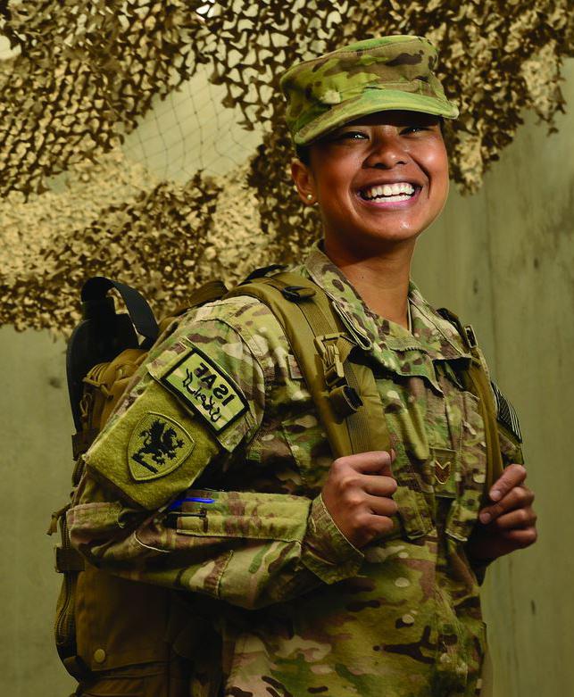 Picture of a female soldier in uniform with backpack